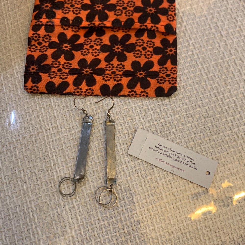 African‎ Beautiful snare hand made earrings made in Africa. 3”